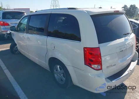 2011 Dodge Grand Caravan Crew z USA, uszkodzony, nr VIN 2D4RN5DG7BR660870